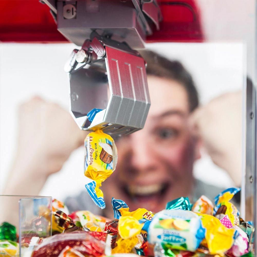 Grab Candy arba žaislų mašinos dozatorius saldumynams ar saldainiams paimti