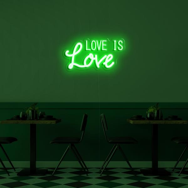 3D neoninis LED logotipas ant sienos - Love is Love, kurio matmenys 50 cm